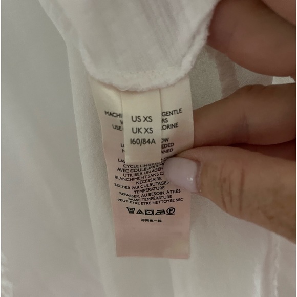 New without tags, never worn.Free People White top. - Picture 4 of 4